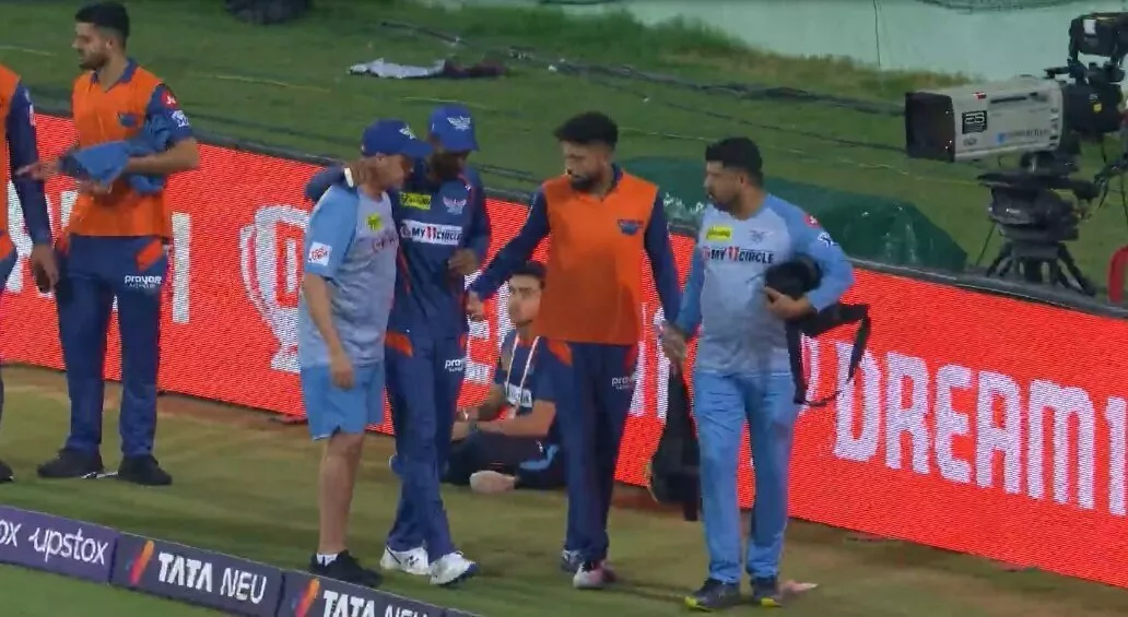 KL Rahul taken off field after picking up an injury.