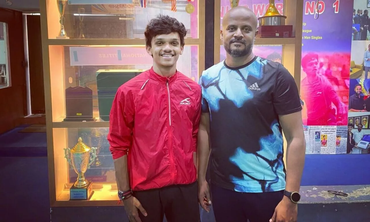 Sankar Muthusamy with coach Aravindan Samiappan