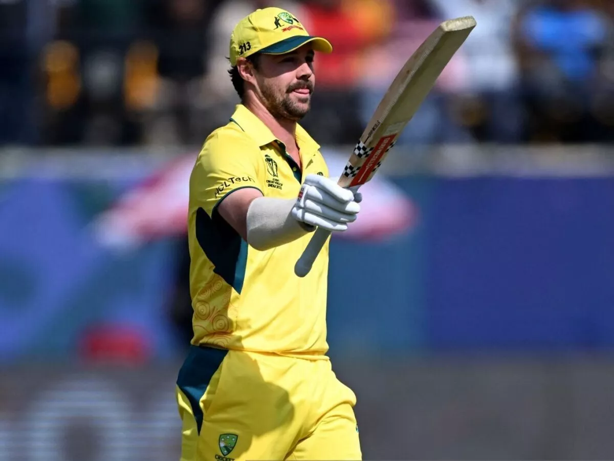 Travis Head celebrates his century