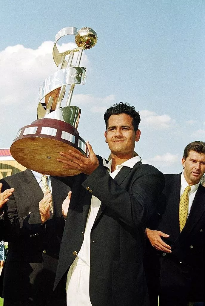 Owais Shah poses with the U19 World Cup trophy