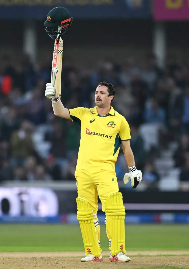 Travis Head celebrates his sixth ODI hundred