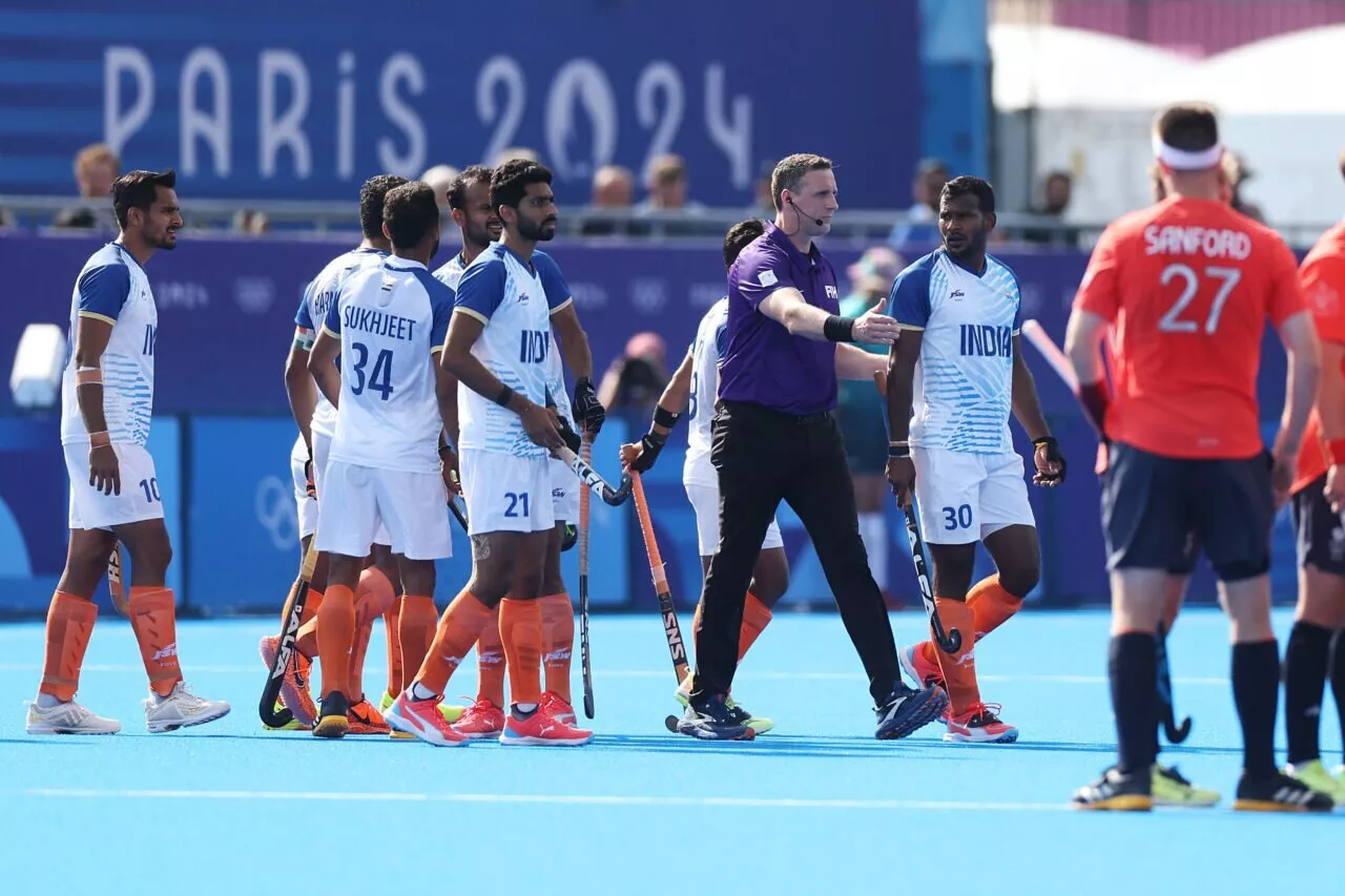 Match Umpire, Sean Rapaport gestures to Amit Rohidas of Team India after he is shown a red card during the Men's Quarter Final match between India and Great Britain on day nine of the Olympic Games Paris 2024 at Stade Yves Du Manoir on August 04, 2024 in Paris, France.