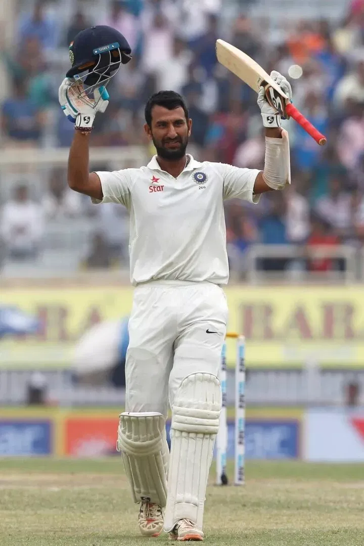 Cheteshwar Pujara celebrates his double hundred against Australia in Ranchi