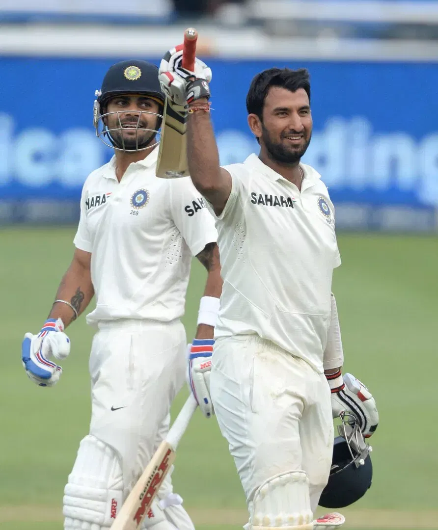 Cheteshwar Pujara celebrates his hundred in Johannesburg test, 2013