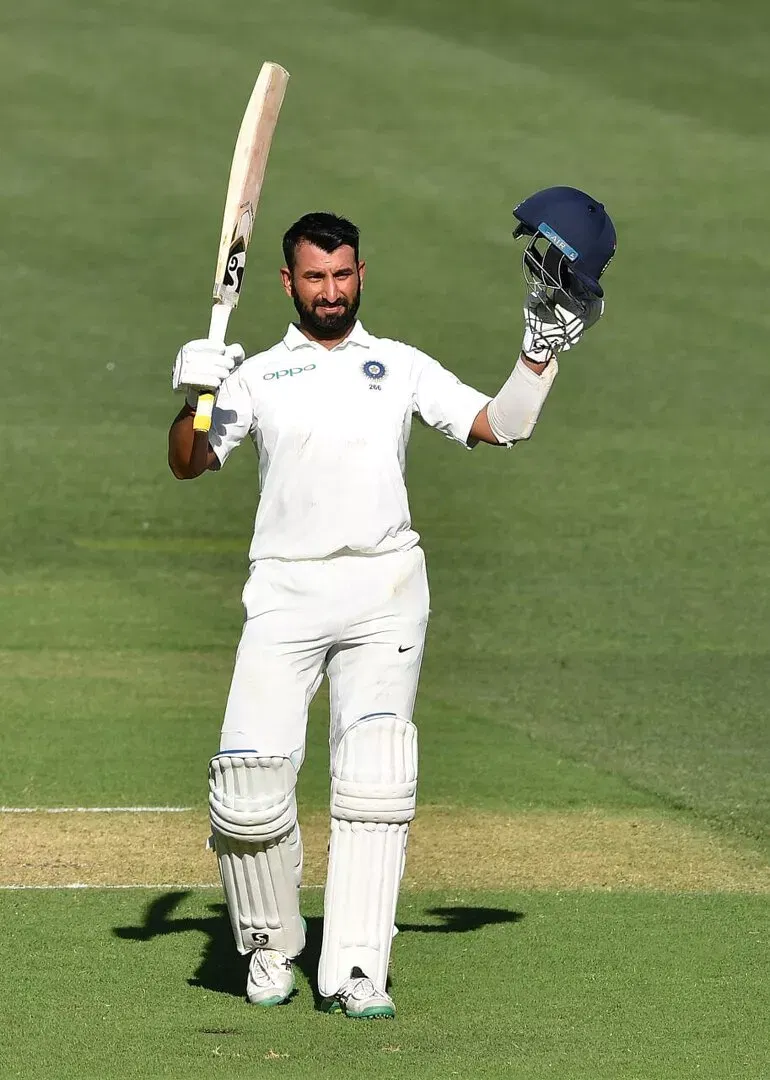 Cheteshwar Pujara celebrates his hundred in the Adelaide test, 2018