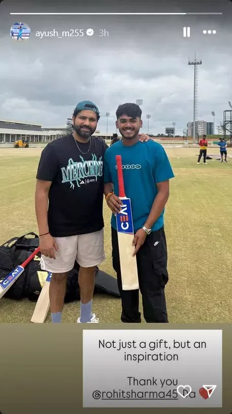 Rohit Sharma gifts bat to Ayush Mhatre