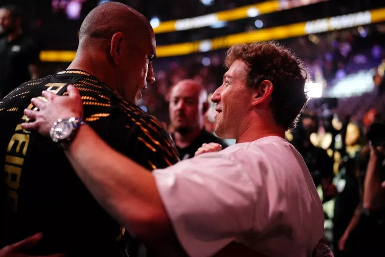 Alex Pereira of Brazil interacts with Mark Zuckerberg following the UFC