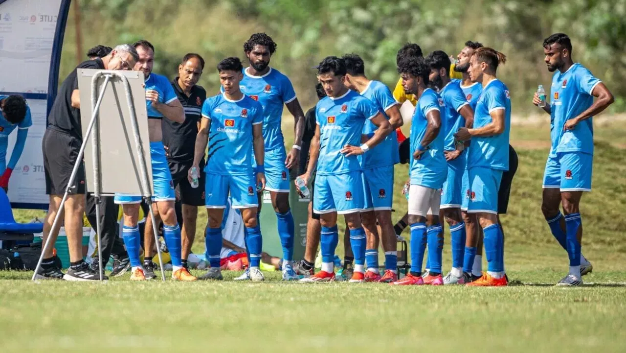 Punjab FC head coach Panagiotis Dilmperis addressing his players.