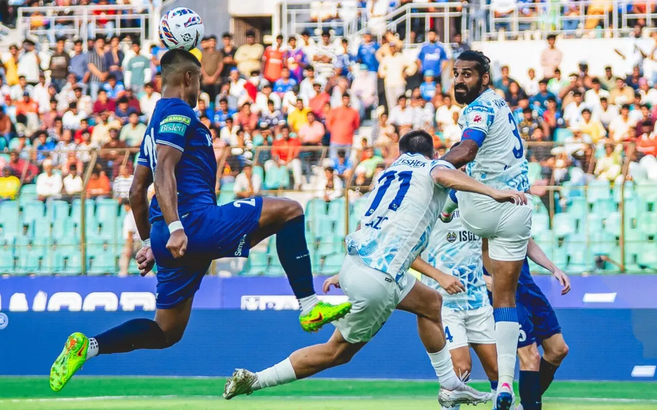 Chennaiyin FC and FC Goa players battling in a set-piece situation