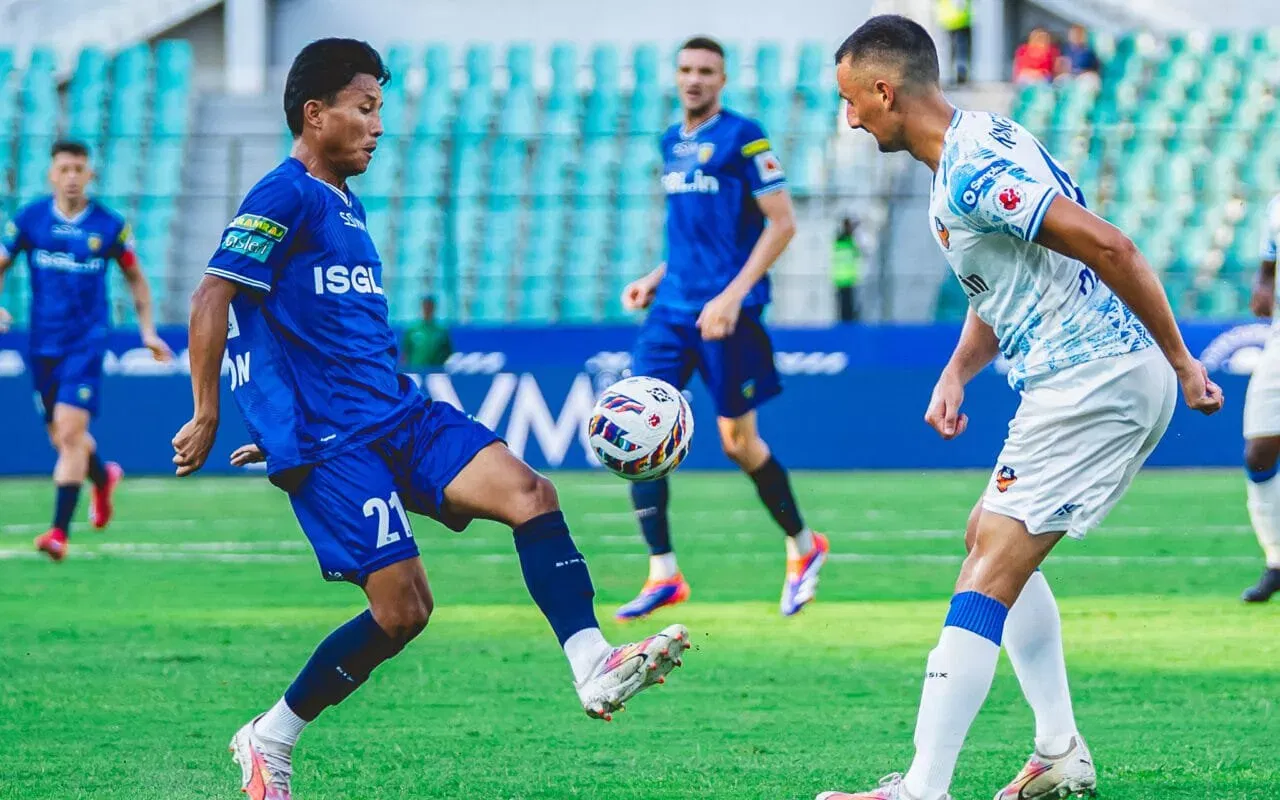 Chennaiyin FC midfielder Maheson Singh in action against FC Goa's Pol Morena in ISL 2025-26