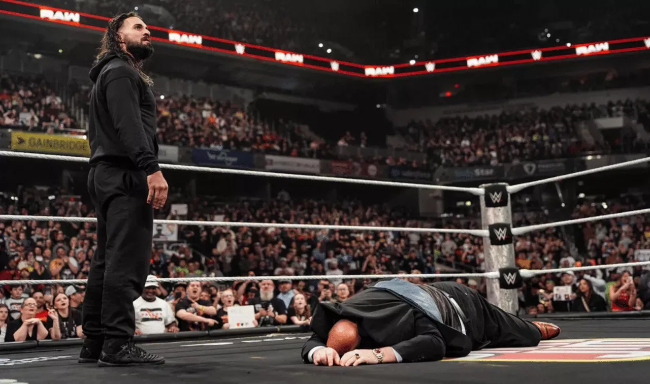 WWE Raw Seth Rollins attacks Paul Heyman