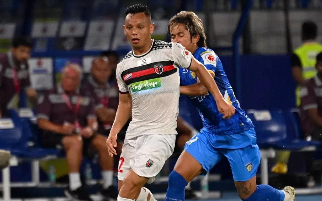 Chennaiyin FC midfielder Jiteshwor Singh and NorthEast United FC winger Redeem Tlang battling for the ball