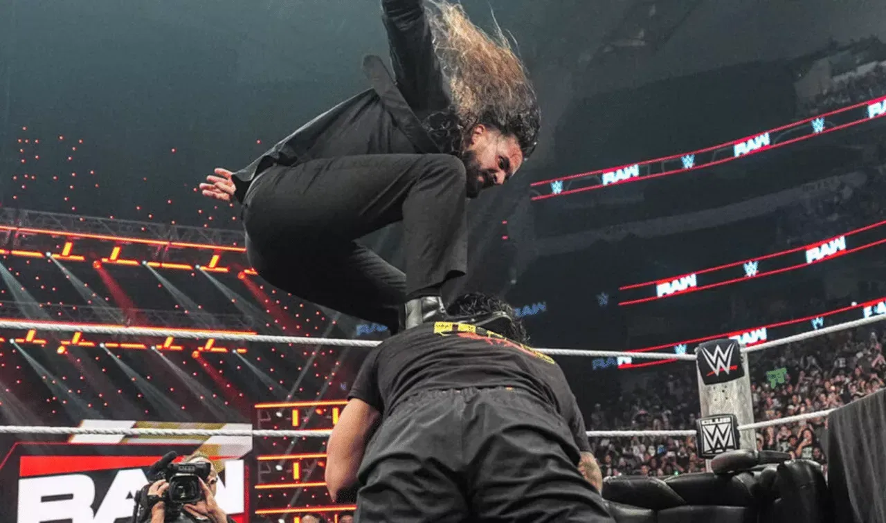 WWE Raw July 13, 26 Seth Rollins lays out Roman Reigns after SummerSlam contract singing in Dallas, Texas