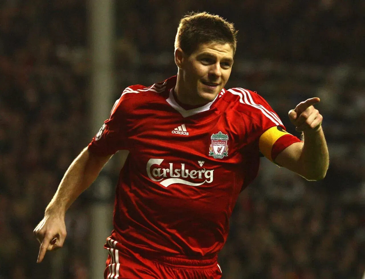 LIVERPOOL, UNITED KINGDOM - MARCH 10: Steven Gerrard of Liverpool celebrates scoring his team's third goal during the UEFA Champions League Round of Sixteen, Second Leg match between Liverpool and Real Madrid at Anfield on March 10, 2009 in Liverpool, England. (Photo by Clive Mason/Getty Images)