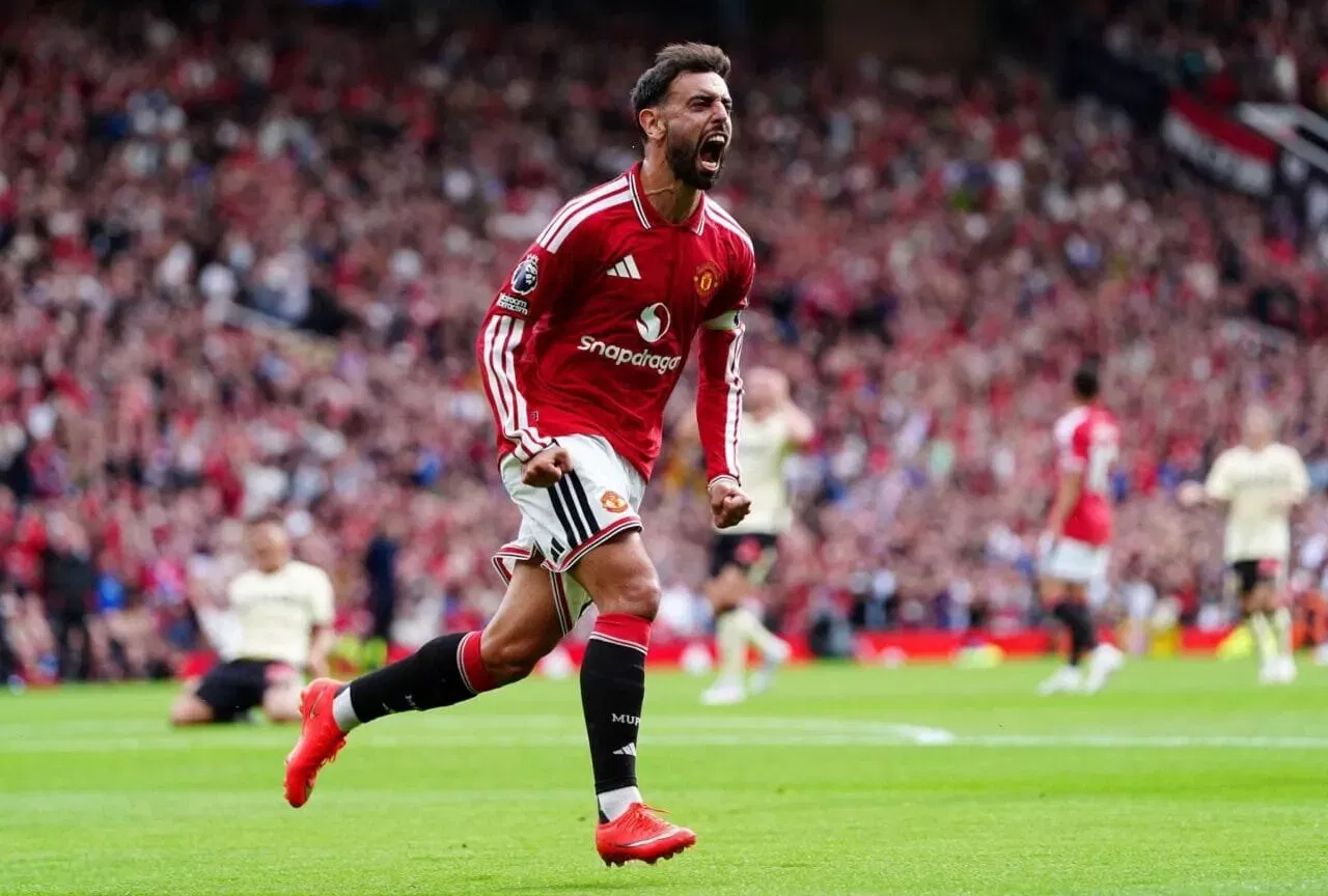 Manchester United's Bruno Fernandes celebrates scoring their side's first goal of the game during the Premier League match at Old Trafford, Manchester. Picture date: Sunday August 30, 2026. (Photo by David Davies/PA Images via Getty Images)