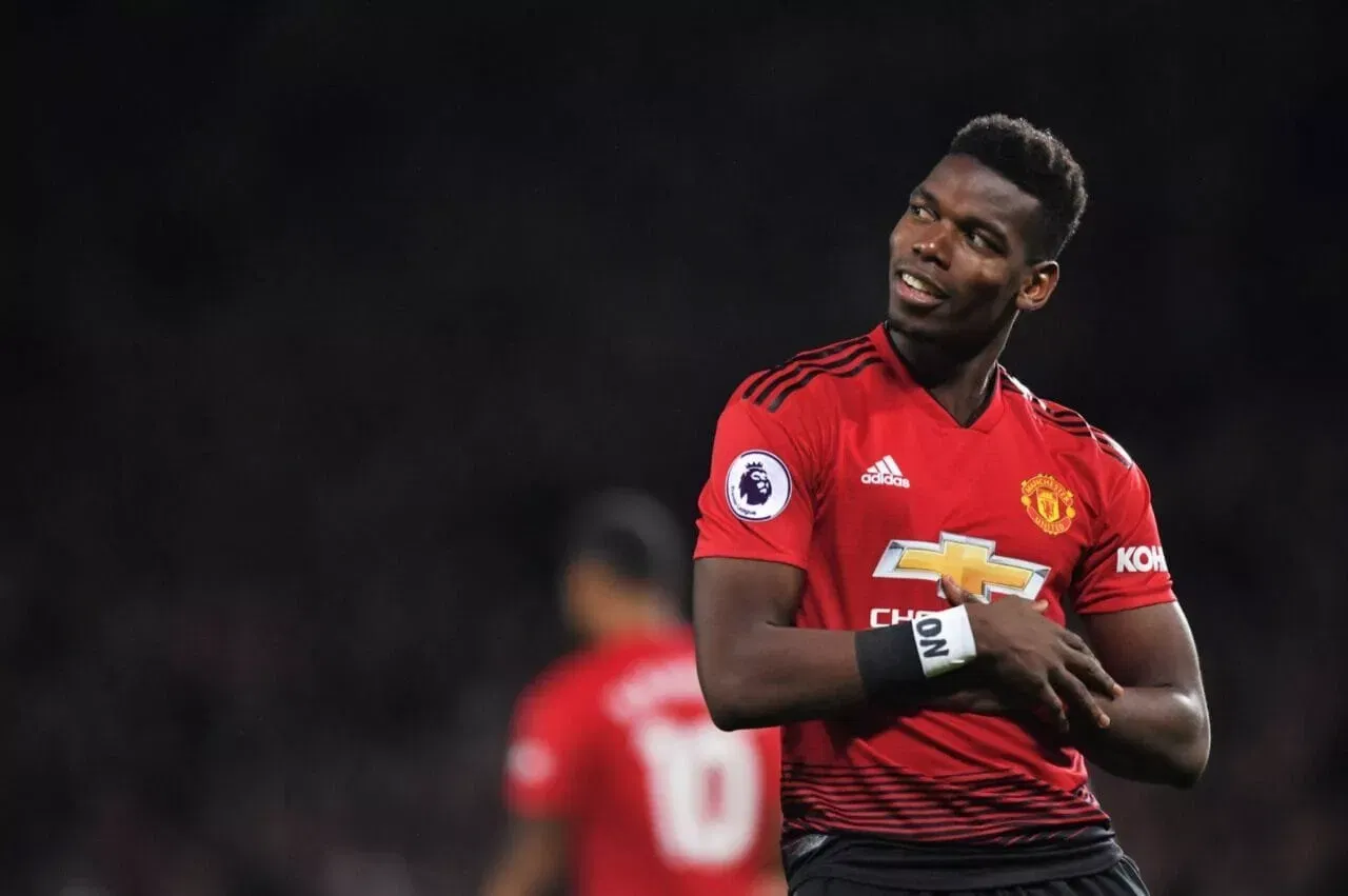 MANCHESTER, ENGLAND - DECEMBER 30: Paul Pogba of Manchester United (6) celebrates as he scores his team's first goal during the Premier League match between Manchester United and AFC Bournemouth at Old Trafford on December 30, 2018 in Manchester, United Kingdom. (Photo by Michael Regan/Getty Images)