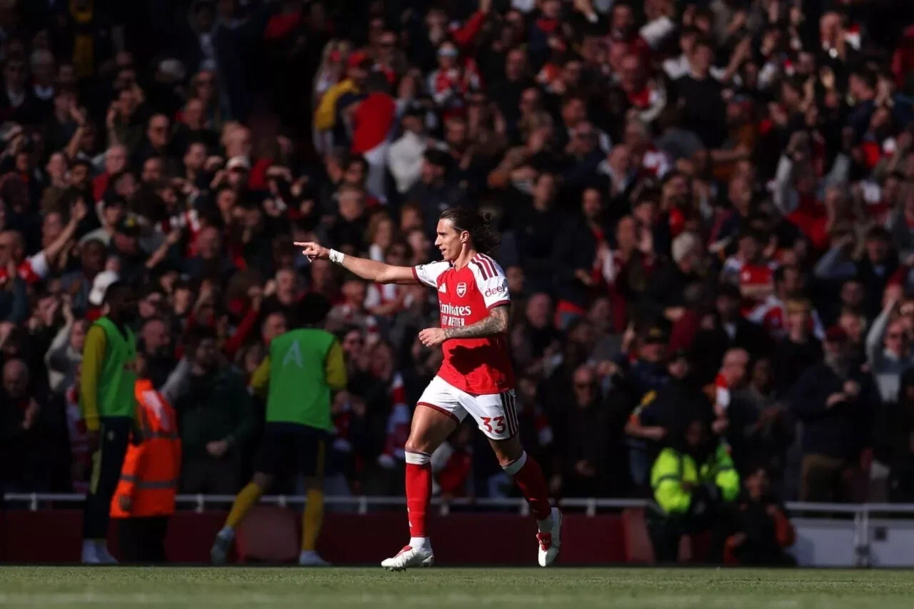 LONDON, ENGLAND - OCTOBER 10: Riccardo Calafiori of Arsenal celebrates scoring his team’s first goal during the Premier League 2026/27 match between Arsenal FC and Leeds United at Emirates Stadium on October 10, 2026 in London, England. (Photo by Alex Pantling/Getty Images)