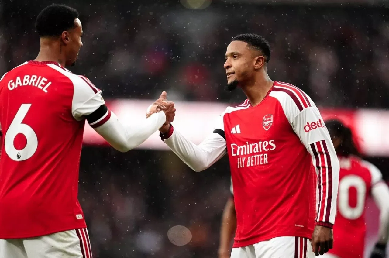 Arsenal's Ezri Konsa (right) celebrates with team-mate Gabriel after scoring their side's first goal of the game during the Premier League match at the Emirates Stadium, London. Picture date: Saturday October 24, 2026. (Photo by Adam Davy/PA Images via Getty Images)