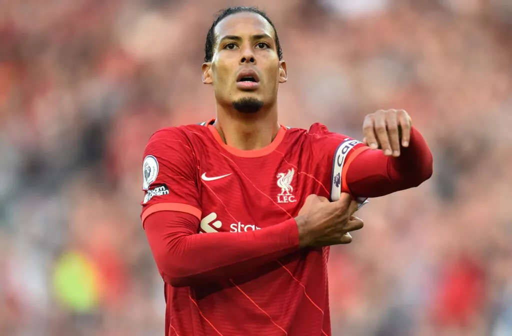 Virgil van Dijk and Mohamed Salah model new Liverpool home kit