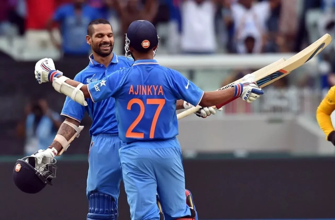 Shikhar Dhawan celebrates his century with Ajinkya Rahane