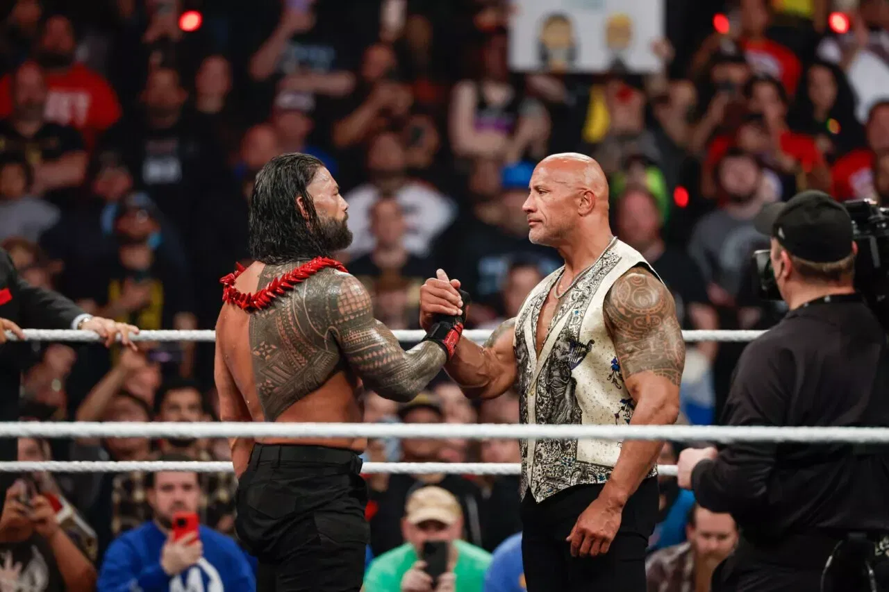 The Rock Roman Reigns WWE Raw