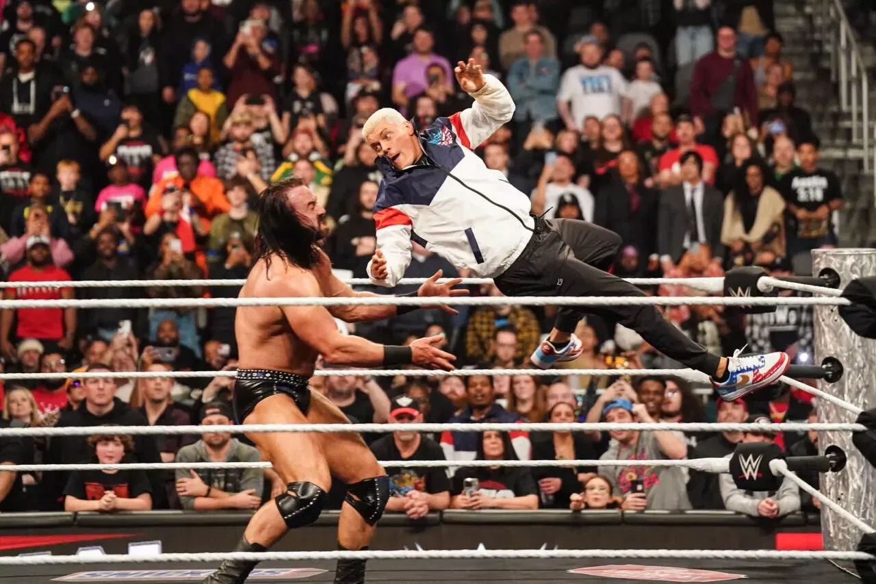 Cody Rhodes delivering a Cody Cutter to Drew McIntyre WWE RAW SmackDown