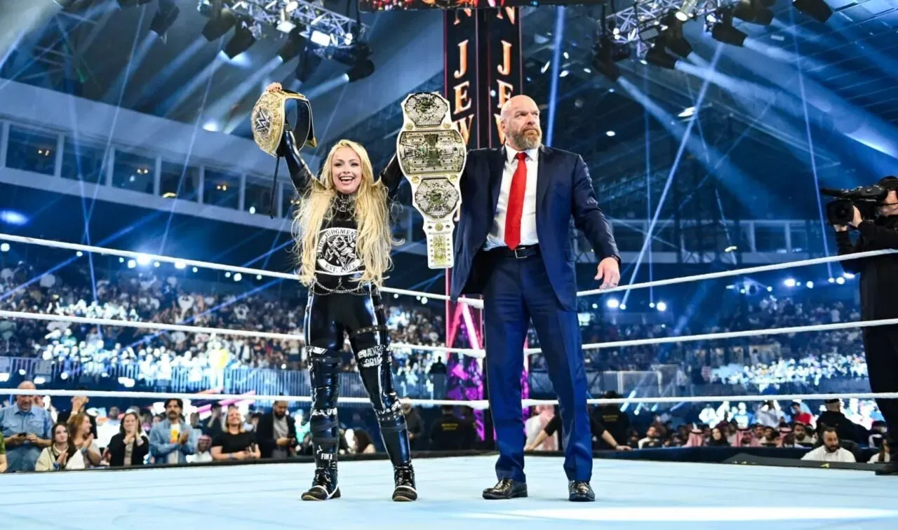 RIYADH, SAUDI ARABIA - NOVEMBER 2: Paul "Triple H" Levesque presents the Crown Jewel Men's Championship to Cody Rhodes during Crown Jewel at Mohammed Abdo Arena on November 2, 2024 in Riyadh, Saudi Arabia. (Photo by WWE/Getty Images)