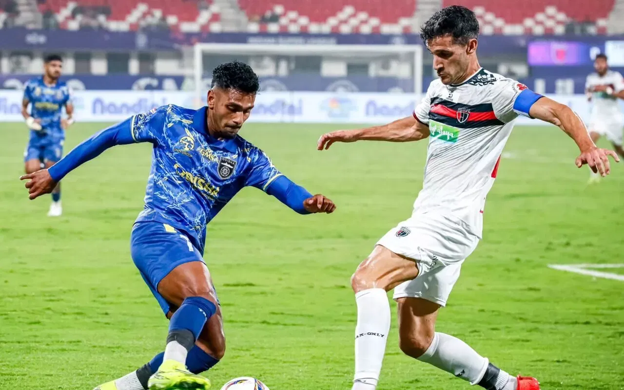 Odisha FC winger Rahul KP and NorthEast United defender Michel Zabaco in action in ISL
