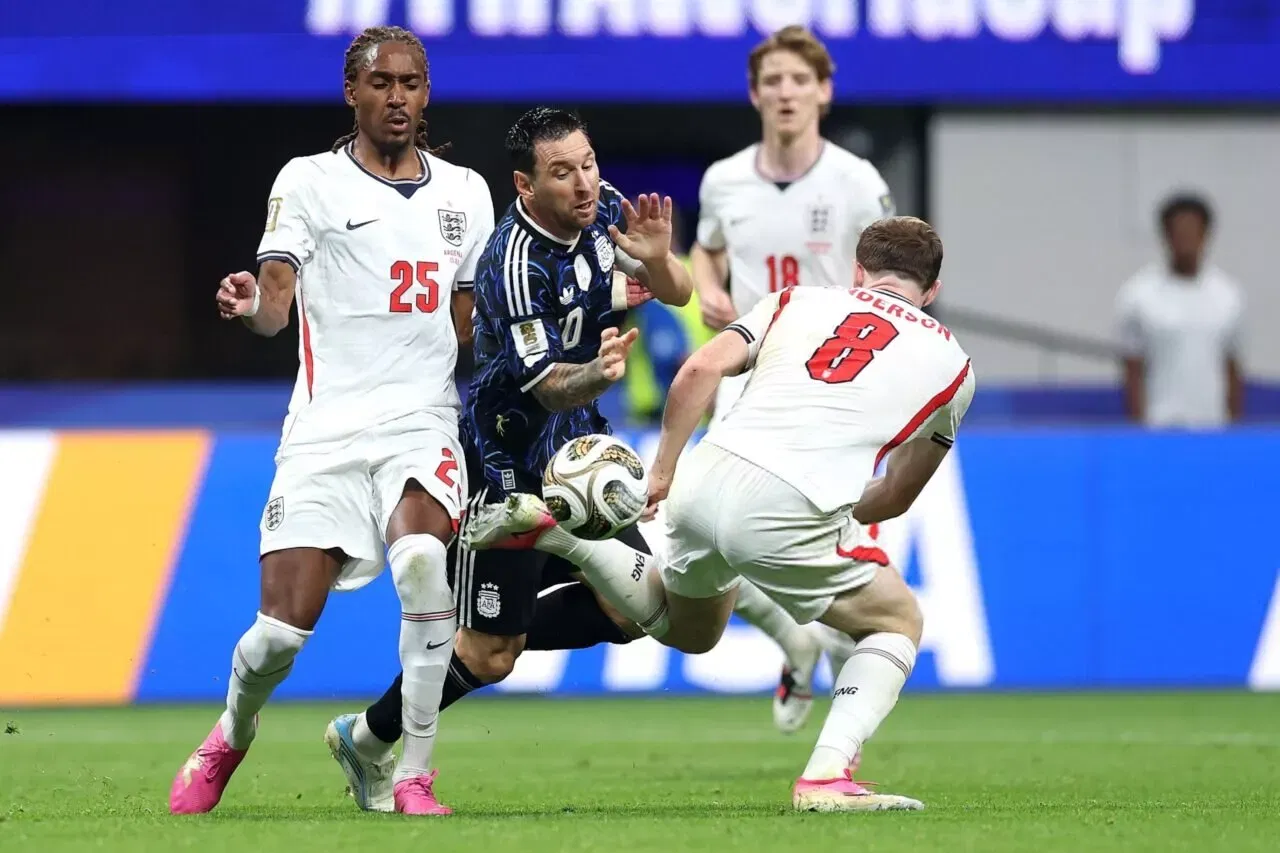 ATLANTA, GEORGIA - JULY 15: Lionel Messi #10 of Argentina competes for the ball against Djed Spence #25 and Elliot Anderson #8 of England during the FIFA World Cup 2026 Semi Final match between England and Argentina at Atlanta Stadium on July 15, 2026 in Atlanta, Georgia. (Photo by Michael Regan - FIFA/FIFA via Getty Images)